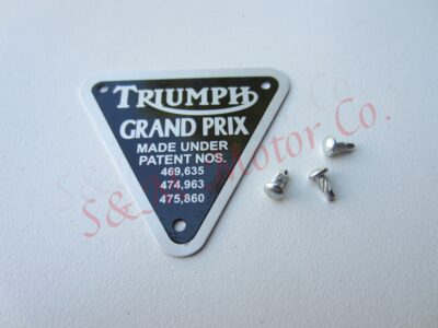 TRIUMPH ''GRAND RRIX' TIMING COVER PATENT PLATE BADGE ALLOY