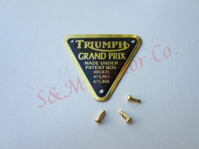 TRIUMPH ‘GRAND PRIX’ TIMING COVER PATENT PLATE BADGE BRASS